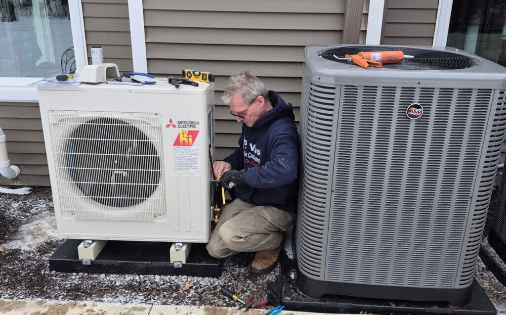 MP Vivo HVAC technician working on full system